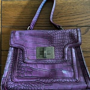 Vera Wang Purple purse with alligator skin design